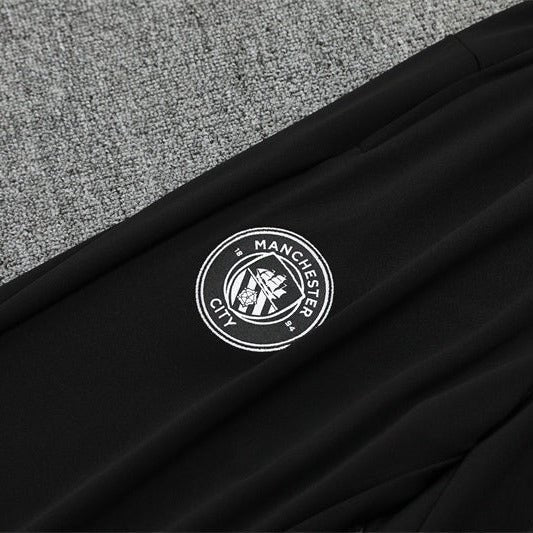 25/26 Manchester City x Asahi Black Kids Size Tracksuit - Premium Quality Jersey at FootballPrestige.com