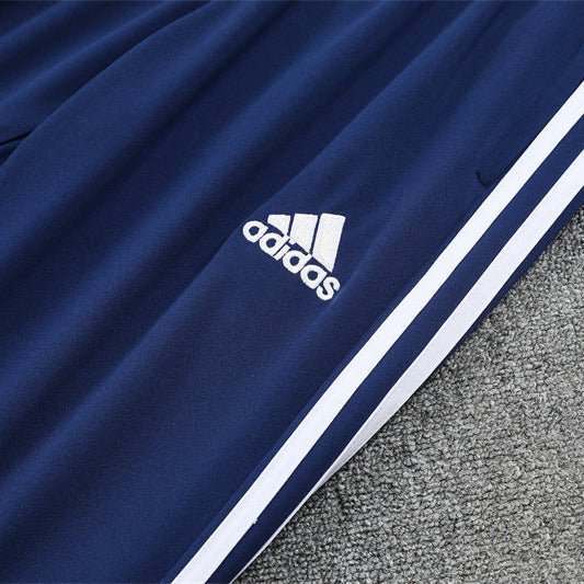 25/26 Real Madrid Retro Blue Kids Size Tracksuit - Premium Quality Jersey at FootballPrestige.com