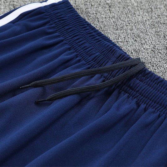 25/26 Real Madrid Retro Blue Kids Size Tracksuit - Premium Quality Jersey at FootballPrestige.com