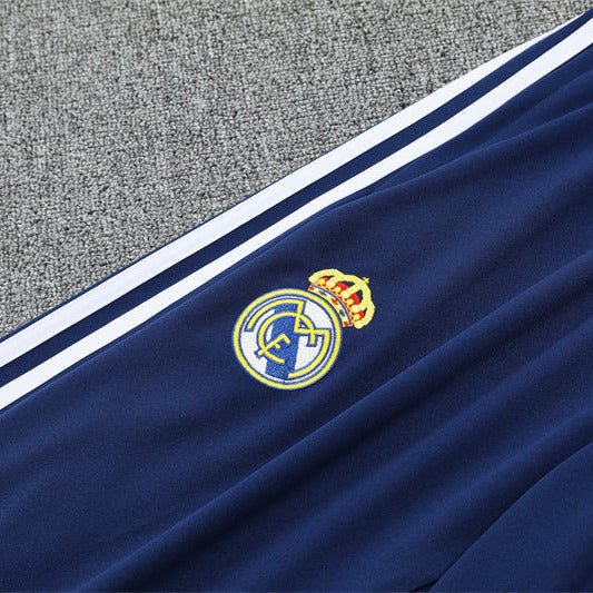 25/26 Real Madrid Retro Blue Kids Size Tracksuit - Premium Quality Jersey at FootballPrestige.com