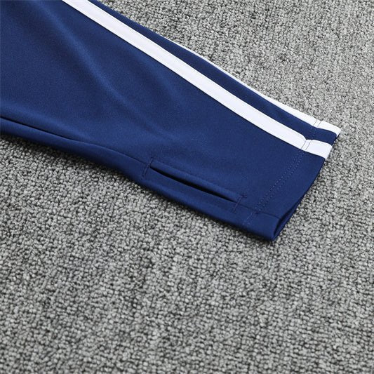 25/26 Real Madrid Retro Blue Kids Size Tracksuit - Premium Quality Jersey at FootballPrestige.com