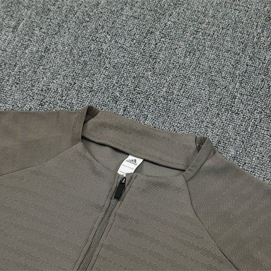 25/26 Real Madrid Training Dark Olive Tracksuit - Premium Quality Jersey at FootballPrestige.com