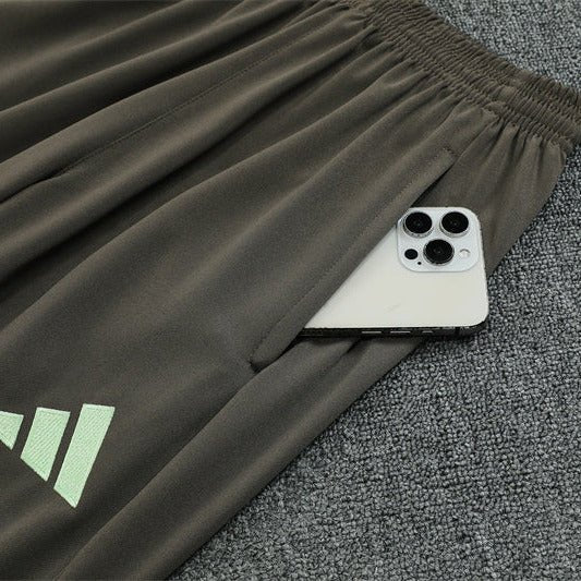 25/26 Real Madrid Training Dark Olive Tracksuit - Premium Quality Jersey at FootballPrestige.com