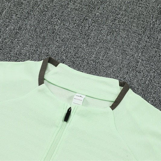25/26 Real Madrid Training Lime Green Kids Size Tracksuit - Premium Quality Jersey at FootballPrestige.com