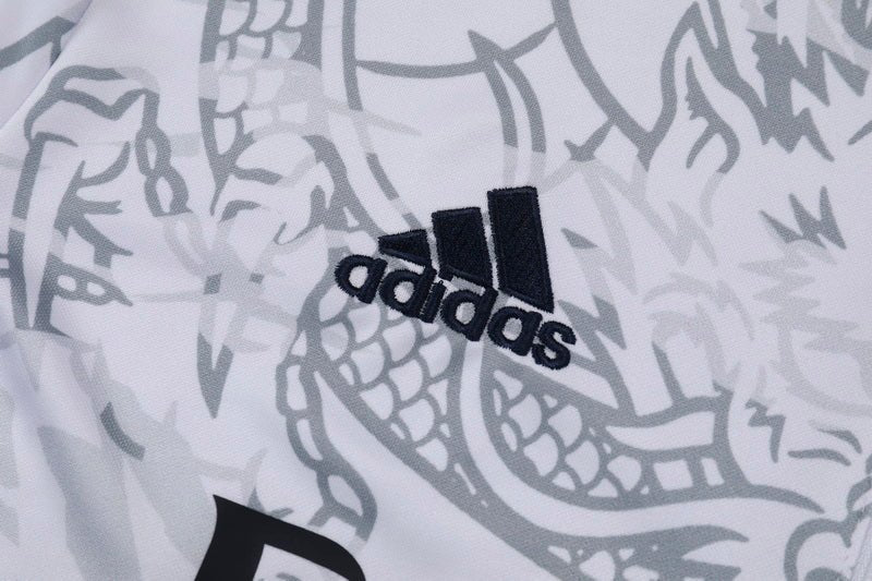 Real Madrid "Dragón Blanco" Premium Tracksuit - Premium Quality Jersey at FootballPrestige.com