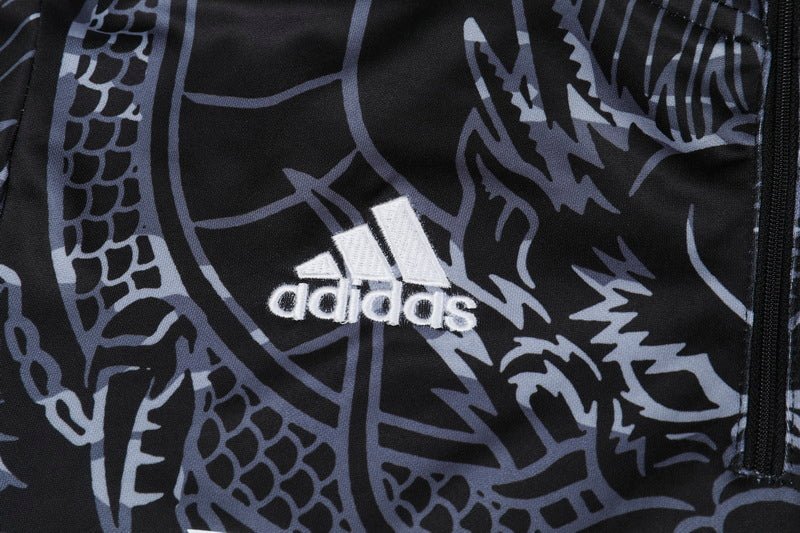 Real Madrid "Dragón Negro" Premium Tracksuit - Premium Quality Jersey at FootballPrestige.com