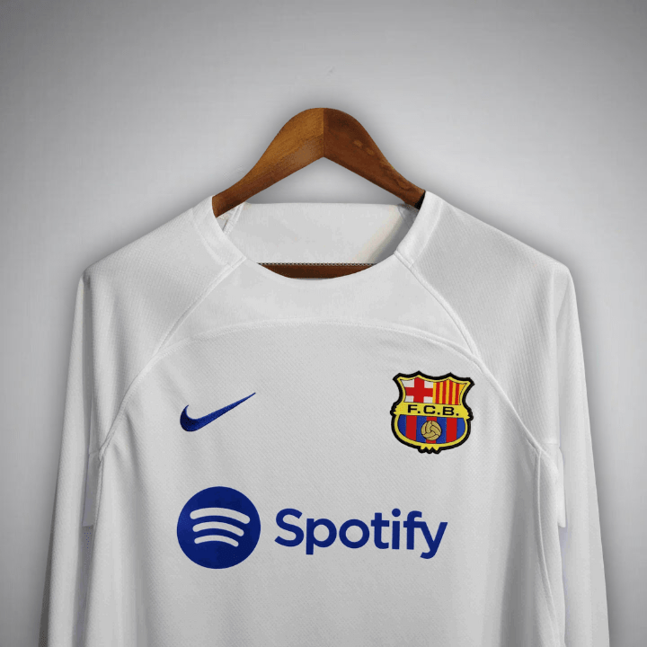 23/24 FC Barcelona White Long Sleeve Away Kit - Premium Quality Jersey at FootballPrestige.com