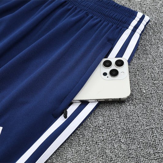 25/26 Real Madrid Retro Blue Kids Size Tracksuit - Premium Quality Jersey at FootballPrestige.com
