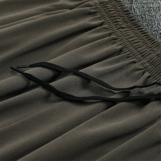 25/26 Real Madrid Training Dark Olive Tracksuit - Premium Quality Jersey at FootballPrestige.com