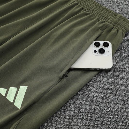 25/26 Real Madrid Training Dark Olive Tracksuit - Premium Quality Jersey at FootballPrestige.com