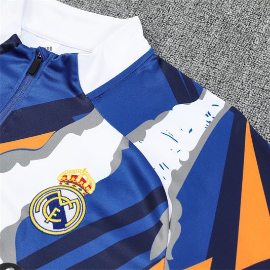 Real Madrid "Azul Reactor" Premium Tracksuit - Premium Quality Jersey at FootballPrestige.com