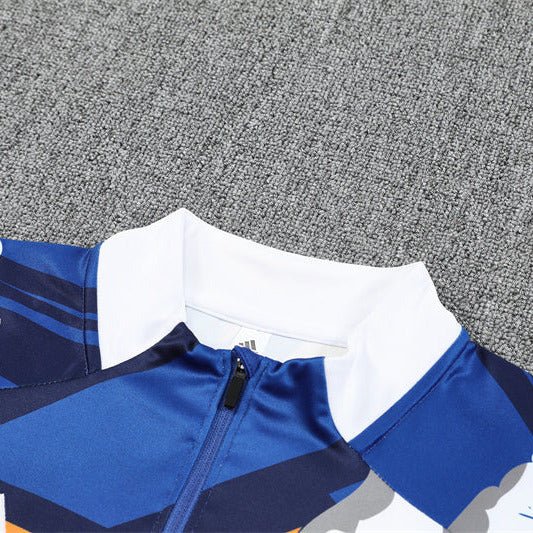 Real Madrid "Azul Reactor" Premium Tracksuit - Premium Quality Jersey at FootballPrestige.com