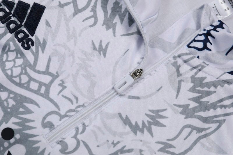 Real Madrid "Dragón Blanco" Premium Tracksuit - Premium Quality Jersey at FootballPrestige.com