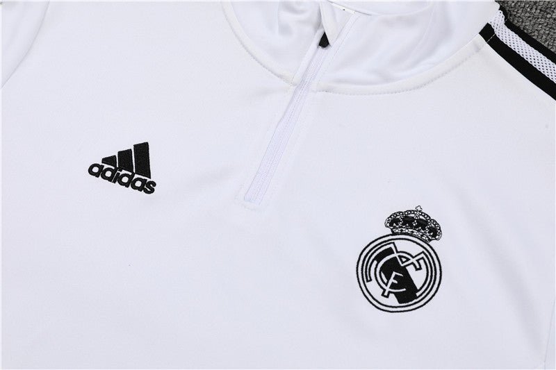 Real Madrid "Momentum" Premium Tracksuit - Premium Quality Jersey at FootballPrestige.com