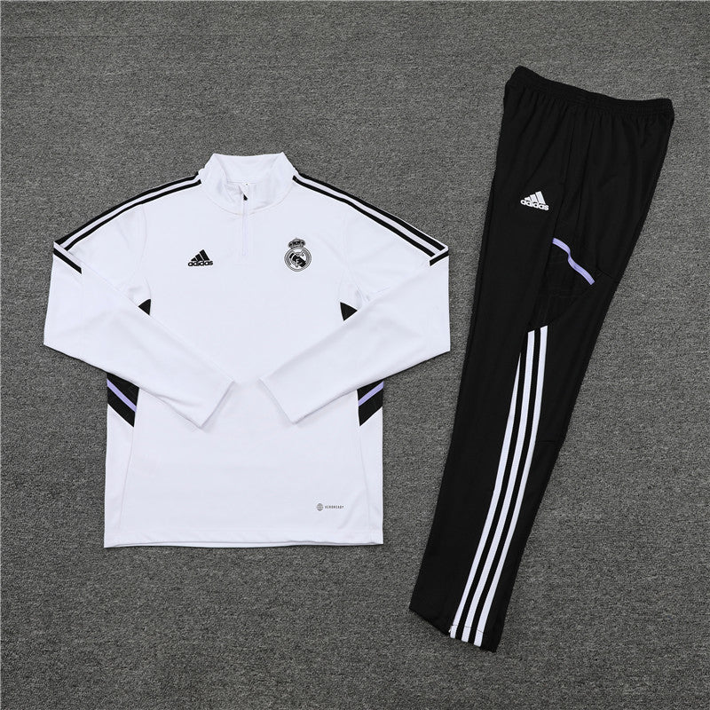 Real Madrid "Momentum" Premium Tracksuit - Premium Quality Jersey at FootballPrestige.com